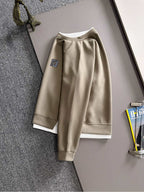 Beige crewneck sweatshirt with long sleeves and small Fendi logo patch