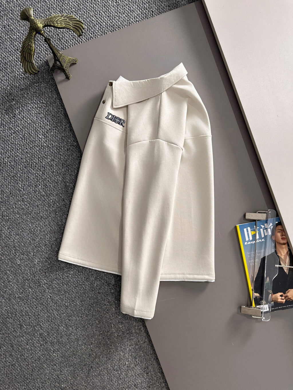 Dior long-sleeve polo shirt on hanger, light cream with collar and small chest logo