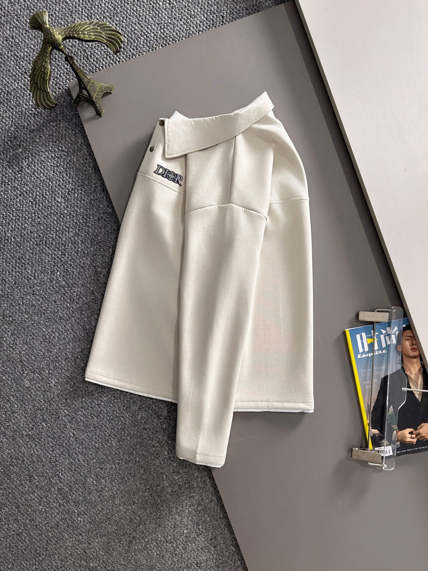Dior long-sleeve polo shirt on hanger, light cream with collar and small chest logo