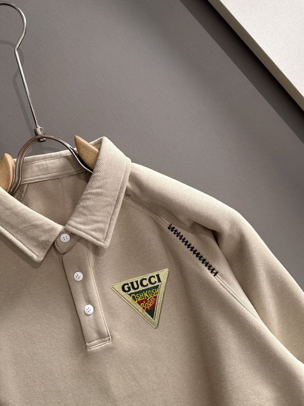 Cream long-sleeve polo shirt with point collar and Gucci logo chest patch
