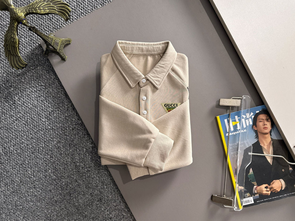 Cream long-sleeve polo shirt with ribbed collar, button front, and Gucci logo patch