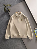 Cream long-sleeve polo shirt with button placket and Gucci logo chest patch
