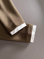 Gucci long-sleeve top hem and sleeve cuff with white contrast trim