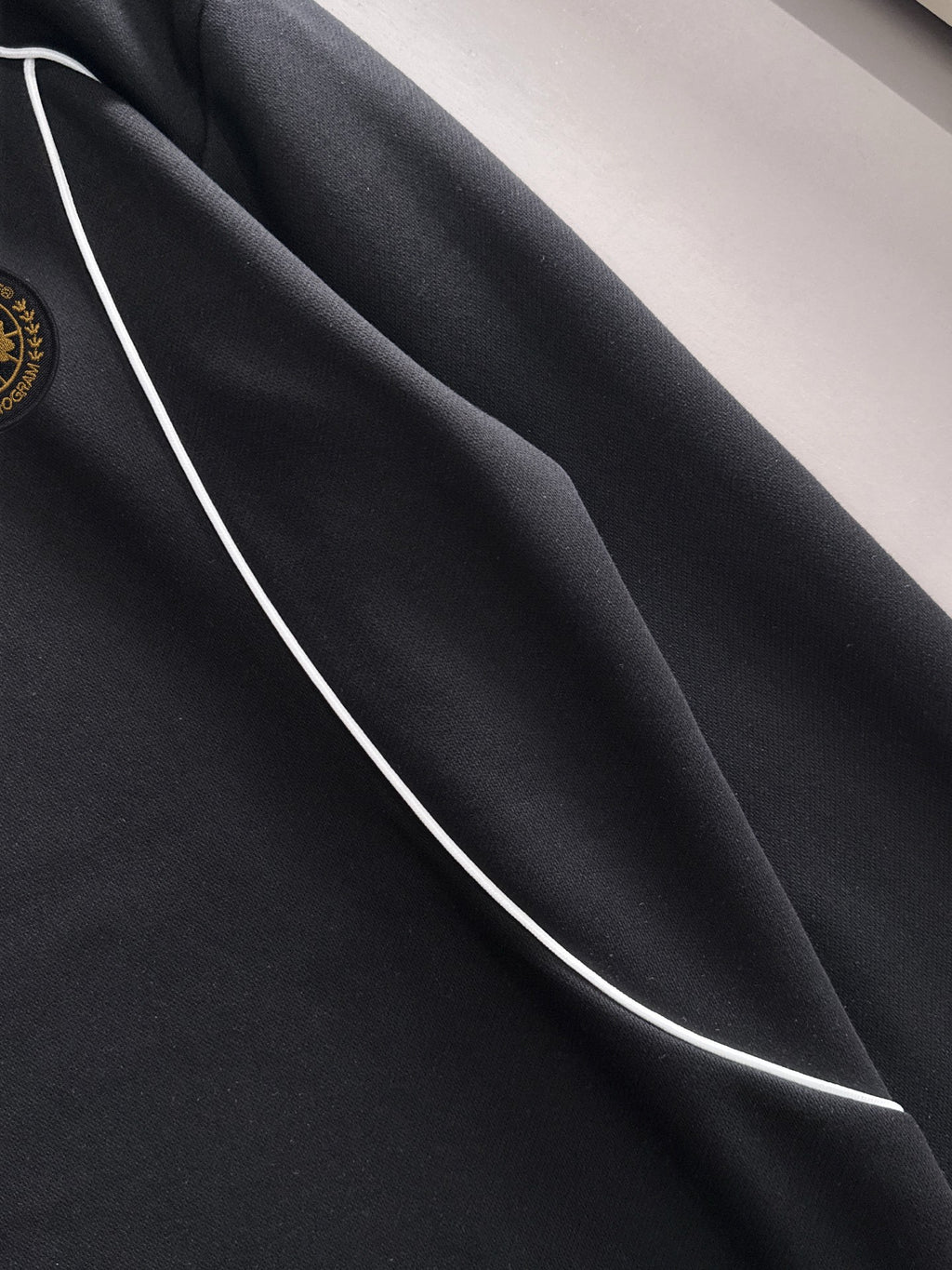 Black sweatshirt panel with white contrast seam piping