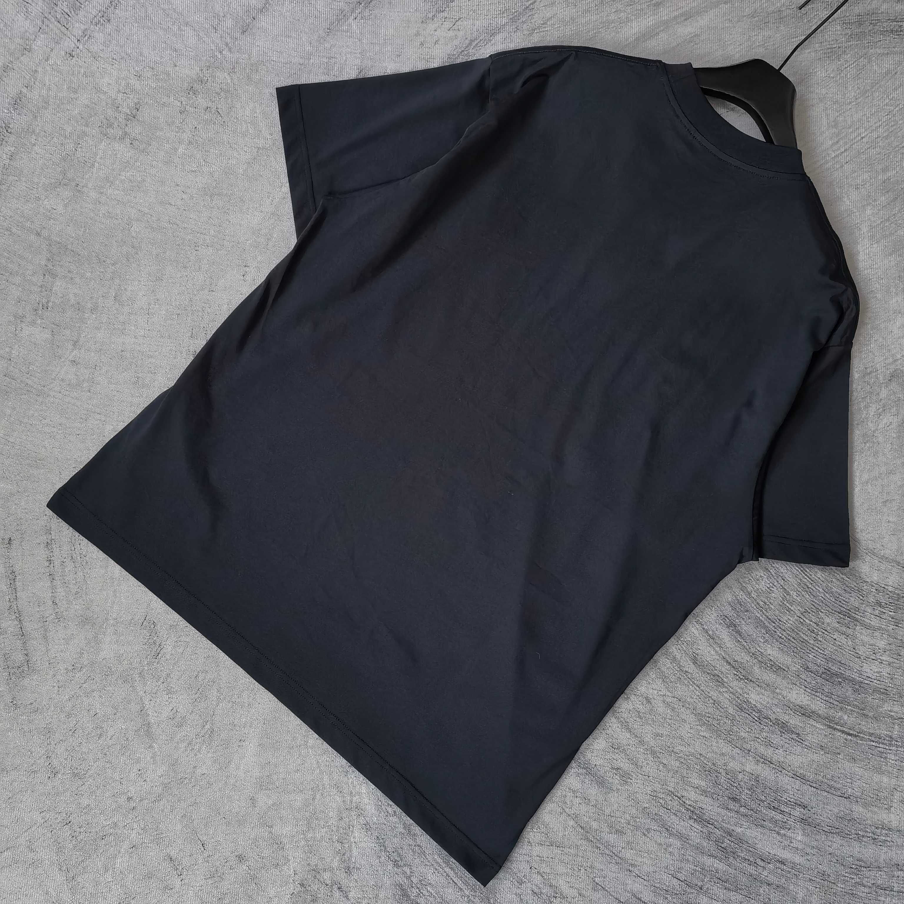 Balenciaga black T-shirt, plain front view with crew neck