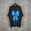 Balenciaga black T-shirt with blue bow graphic at center