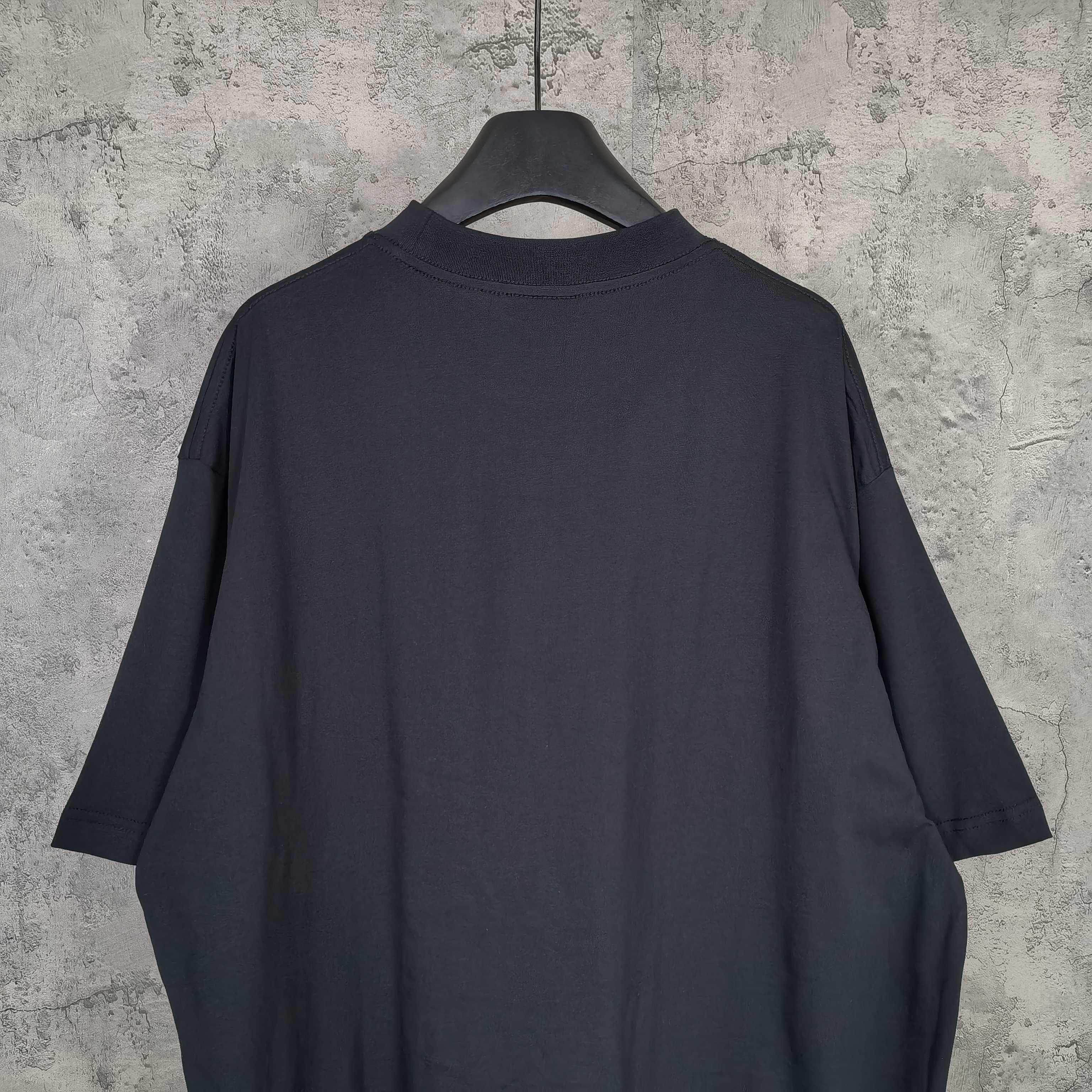 Balenciaga black T-shirt, plain back view with crew neck and short sleeves