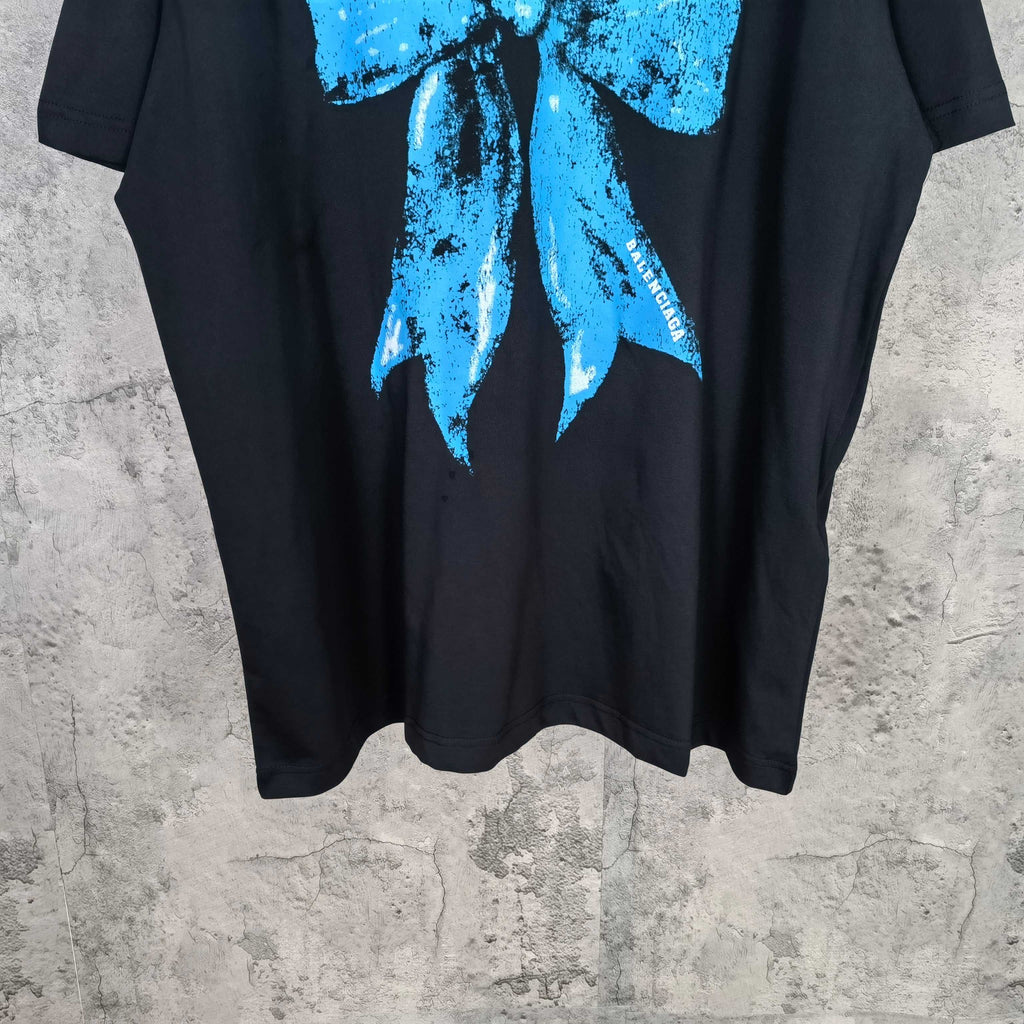 Black graphic T-shirt with blue splatter print and Balenciaga logo