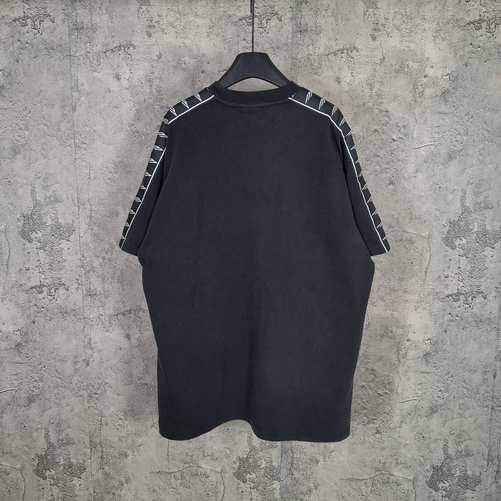 Balenciaga short-sleeve T-shirt, dark with contrast sleeve stripes and crew neck