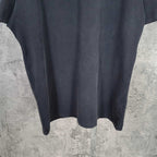 Balenciaga dark shorts with curved hem and vertical seam details