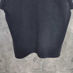 Balenciaga dark shorts with curved bottom and textured fabric