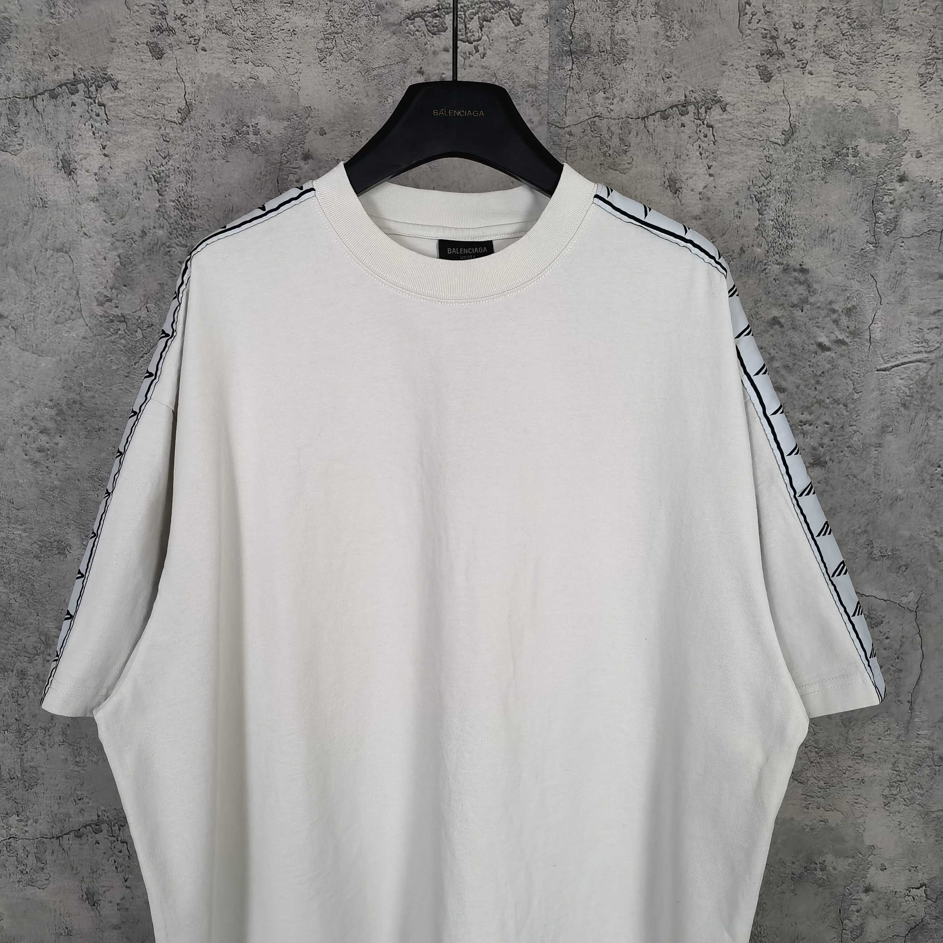 Balenciaga white crewneck T-shirt with patterned stripe trim along both shoulders