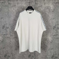 Balenciaga white crewneck T-shirt with patterned stripe trim on sleeves