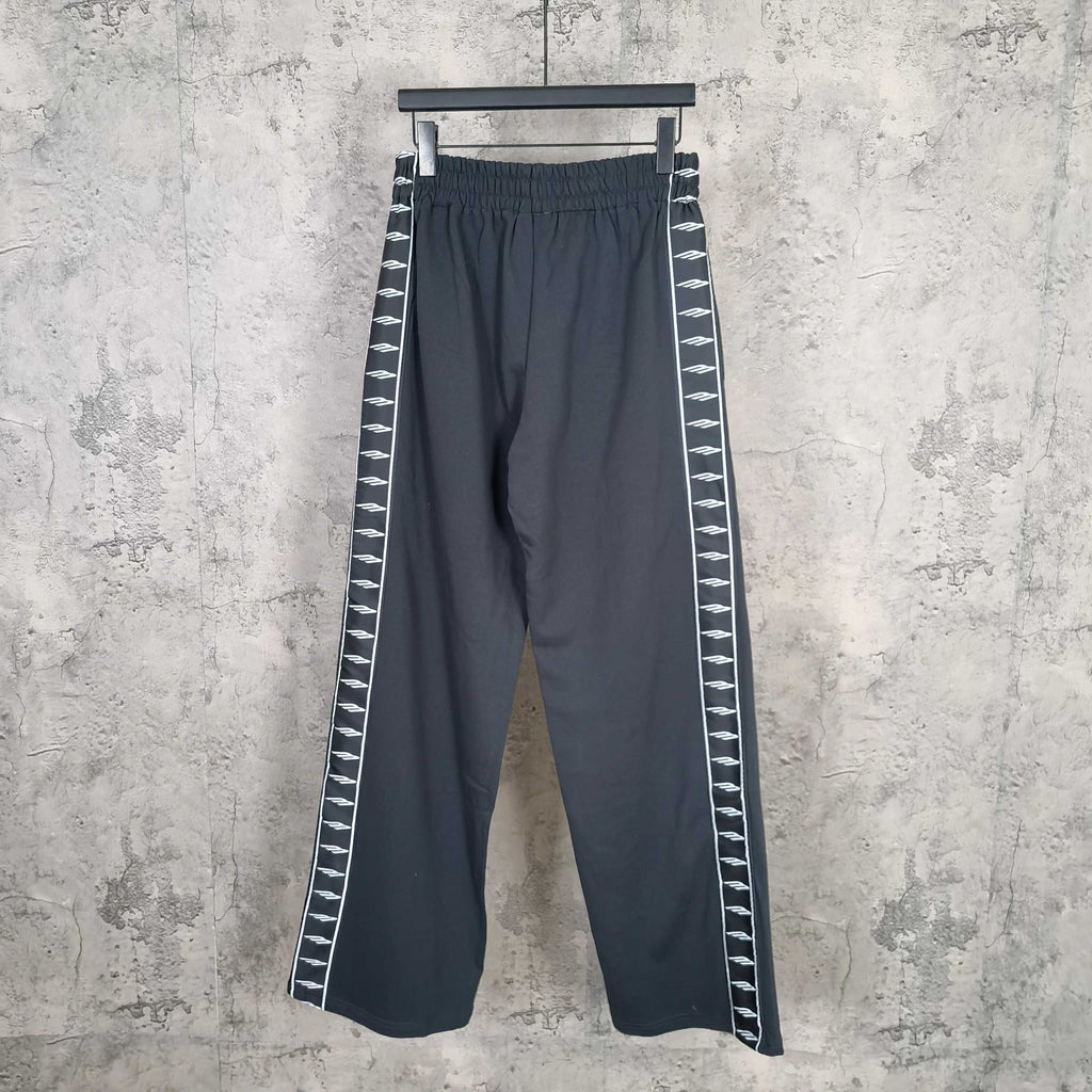 Balenciaga wide-leg pants with elastic waistband and white patterned side stripe