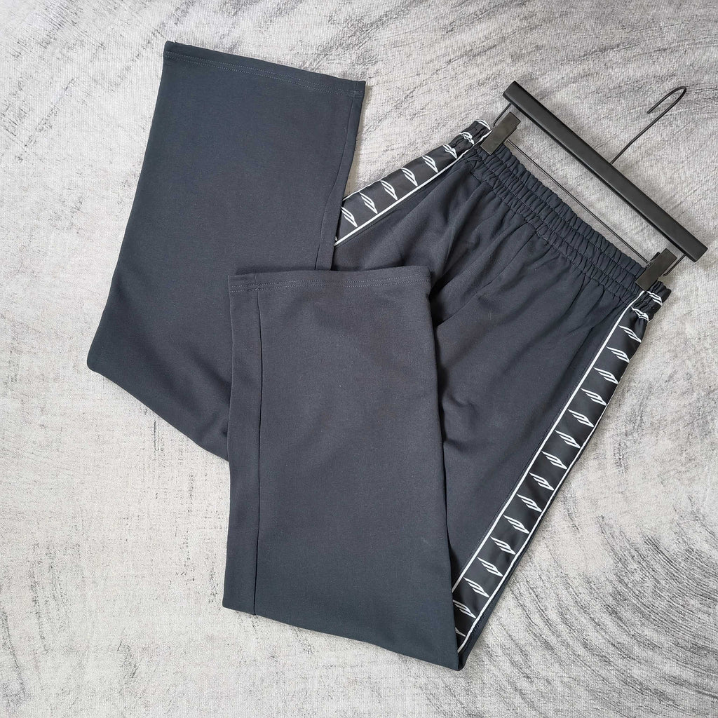 Balenciaga pants set with elastic waist: dark solid pair and dark striped pair