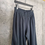 Balenciaga wide-leg pants with elastic waistband in dark blue/charcoal solid fabric