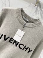 Givenchy crewneck sweatshirt with hanging white brand tag and black GIVENCHY print