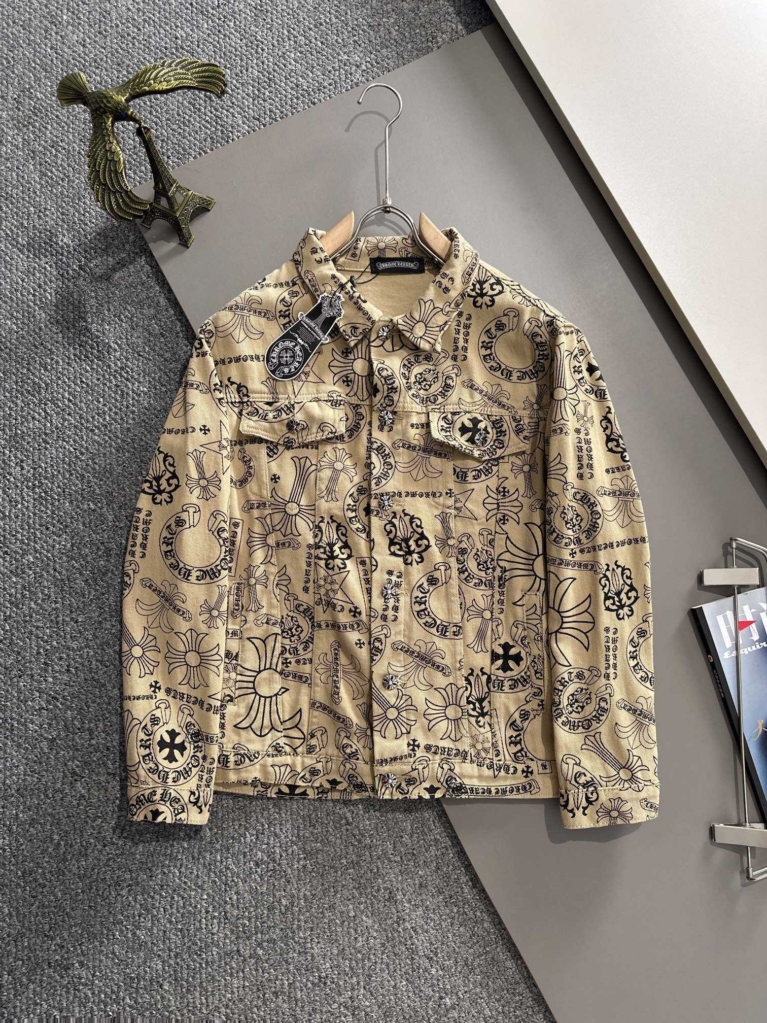 Long-sleeve button-up shirt with ornate black and dark-blue print on beige