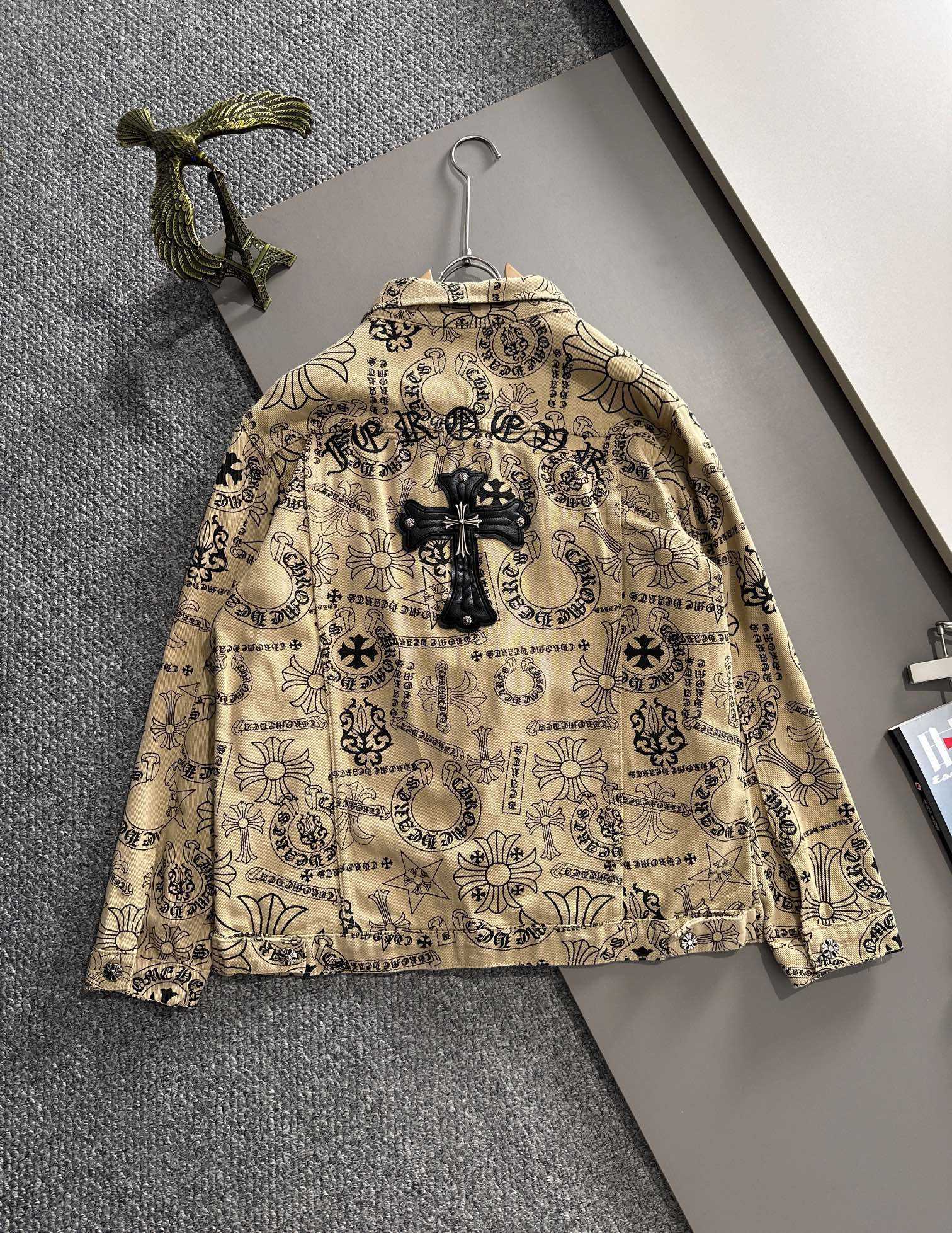 Long-sleeve button-up shirt on hanger with ornate print and button front, beige