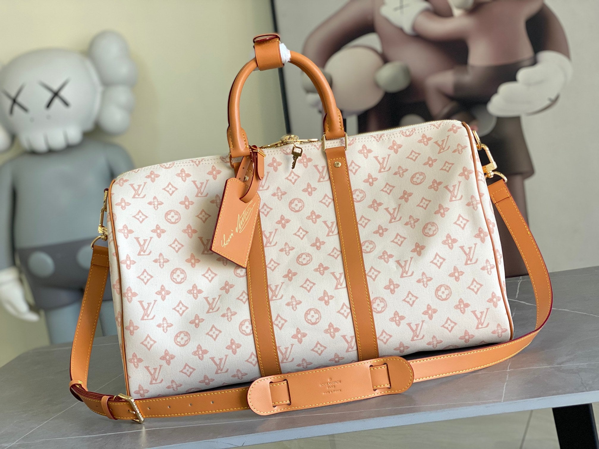 Louis Vuitton monogram satchel bag with tan leather trim and shoulder strap