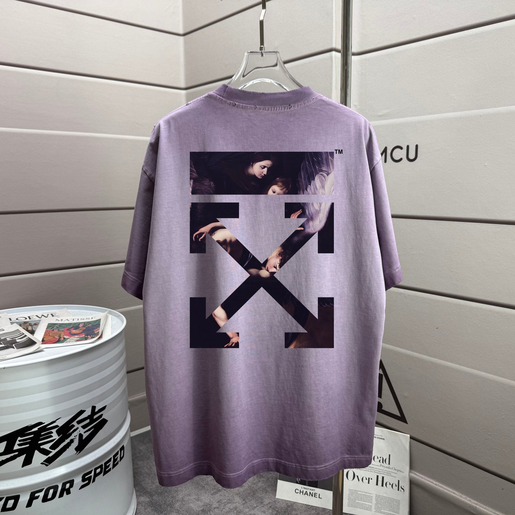 Lavender T-shirt with large back graphic print and crossed stripe design