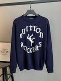 Navy knit long-sleeve sweater with large white graphic lettering on front