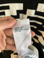 Knit sweater care label on inner seam