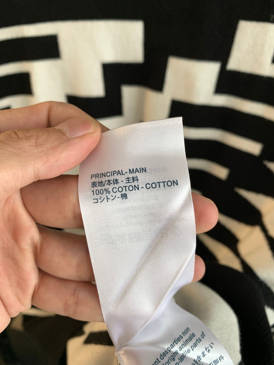 Knit sweater care label on inner seam