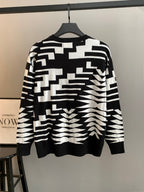 Louis Vuitton knit sweater with black-and-white geometric pattern and long sleeves