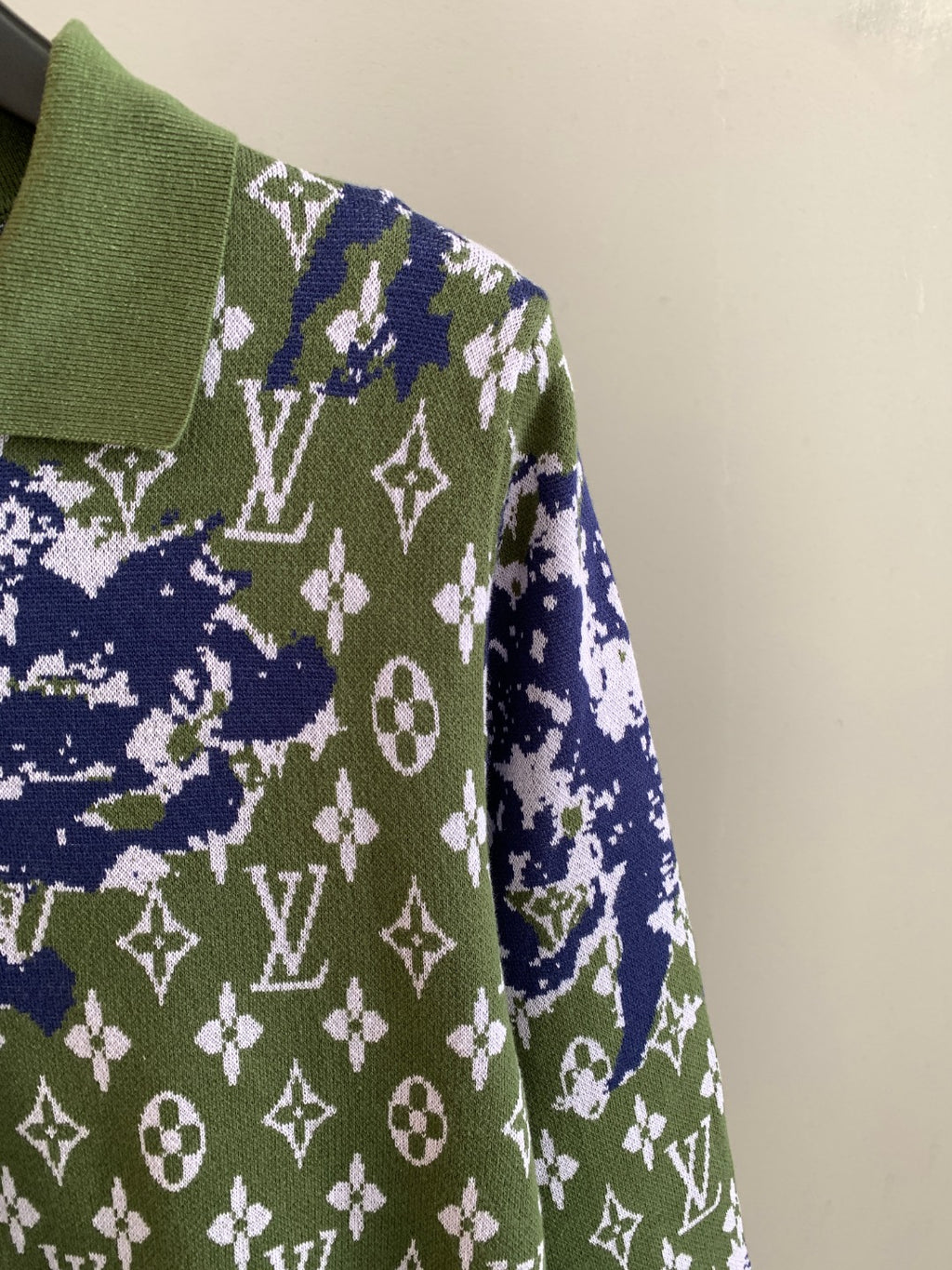 Louis Vuitton knit sweater sleeve in green with blue and white monogram motifs