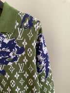 Louis Vuitton knit sweater sleeve in green with blue and white monogram motifs