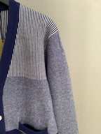 Long cardigan sleeve with vertical striped knit upper and gray body panel