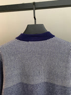 Long cardigan by Gucci with ribbed navy collar and striped back yoke