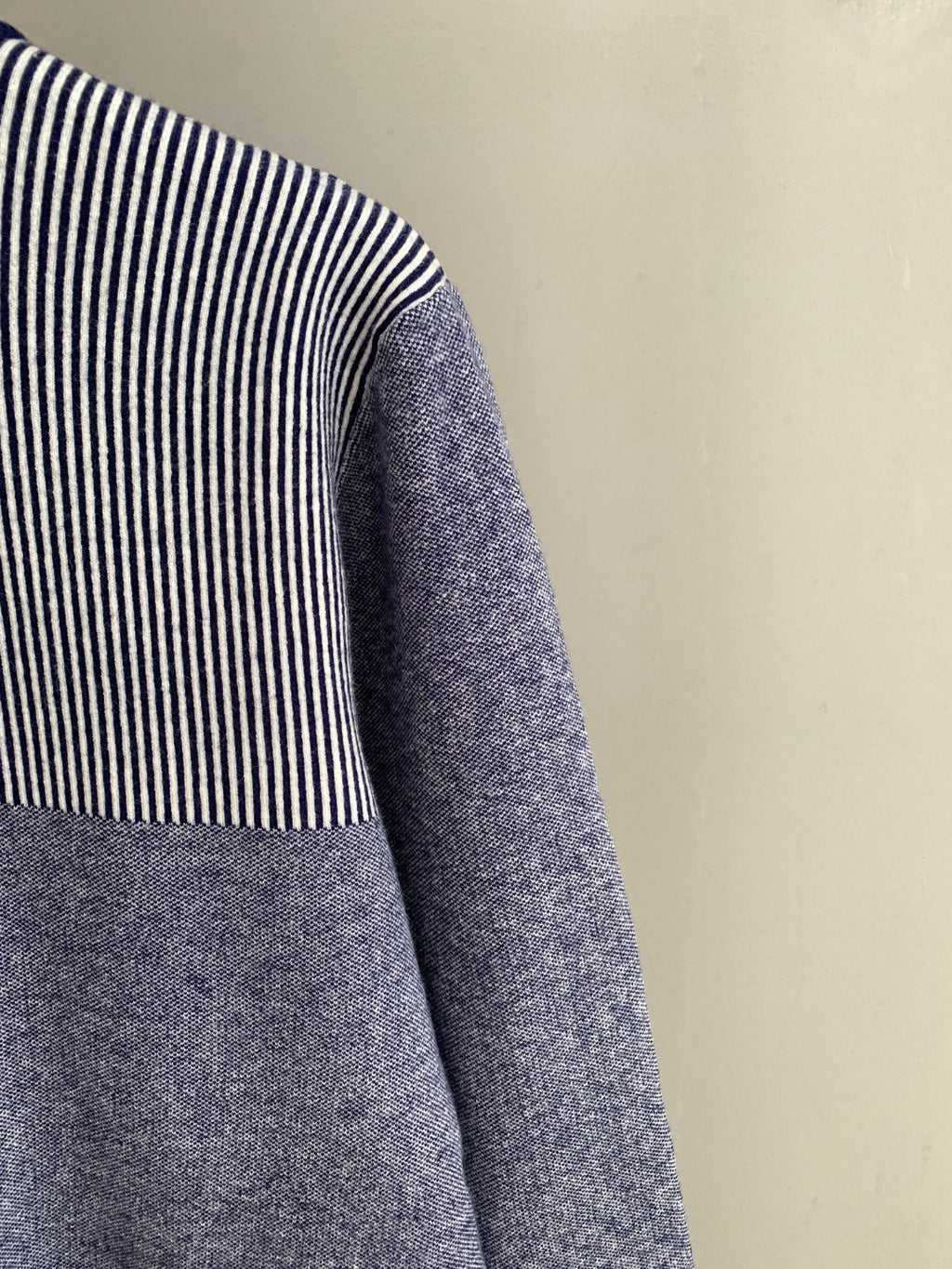 Long cardigan sleeve with striped shoulder panel and heather gray knit body
