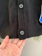 Knit cardigan cuff with two button closures