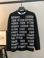 Black long-sleeve crewneck sweater with white "Fashion" and "Separate" text print