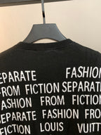 Black crewneck sweater with white text print near collar and upper chest