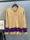 Gucci knit sweater with V-neck, cream base and red/blue striped hem