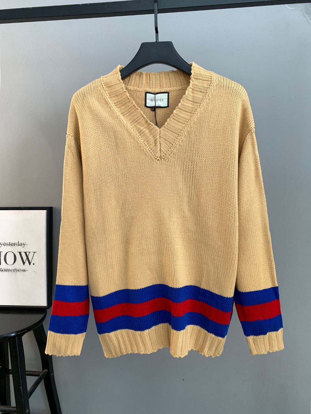 Gucci knit V-neck sweater with cream body and blue/red stripe hem