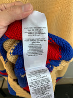 Sweater care label with fabric content text and washing instructions