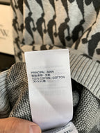 Sweater care label showing cotton and blend content