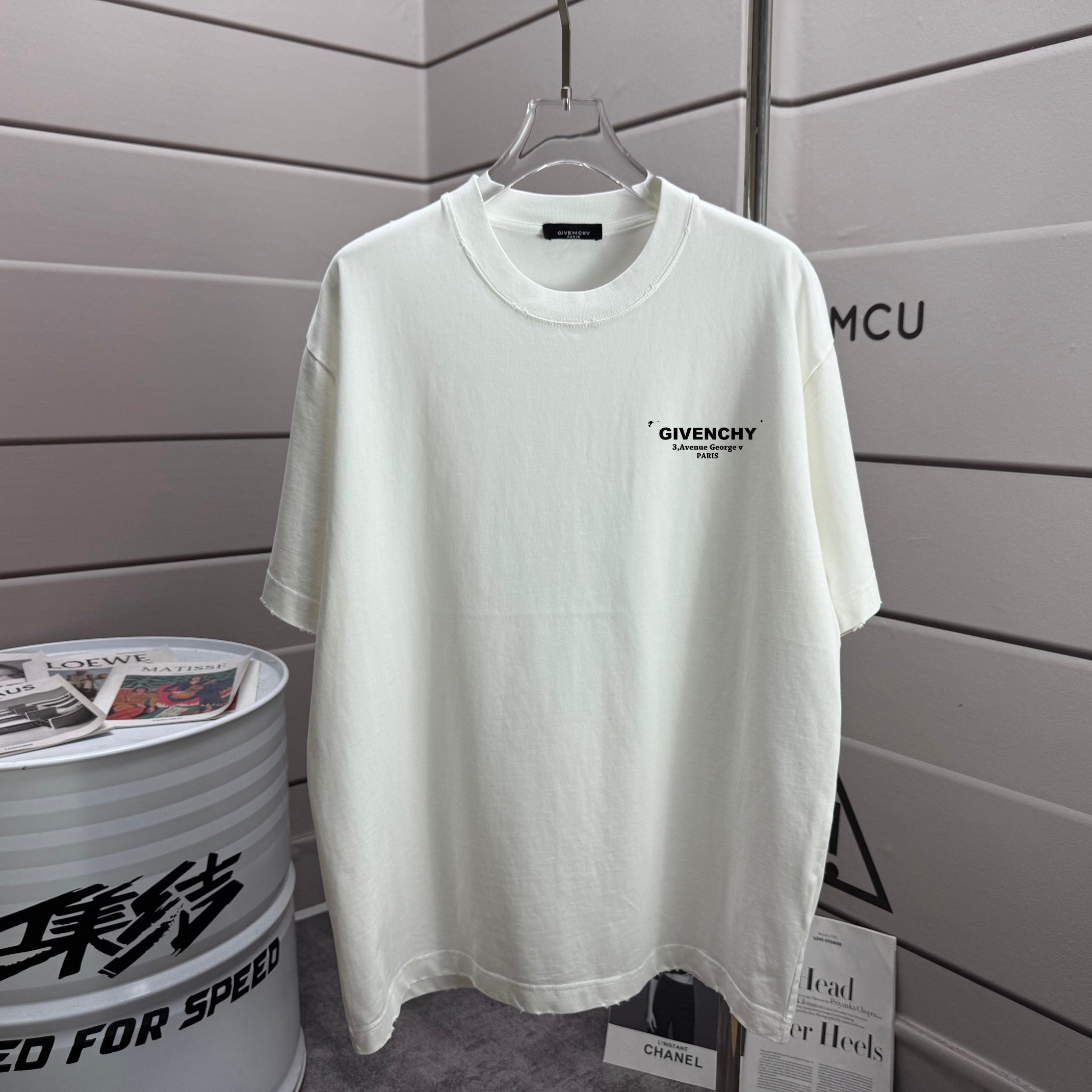 White Givenchy T-shirt with short sleeves and small chest logo, round crew neck