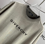 Givenchy T-shirt in light gray with GIVENCHY lettering across the chest