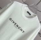 White Givenchy T-shirt close-up of crew neck and front logo lettering