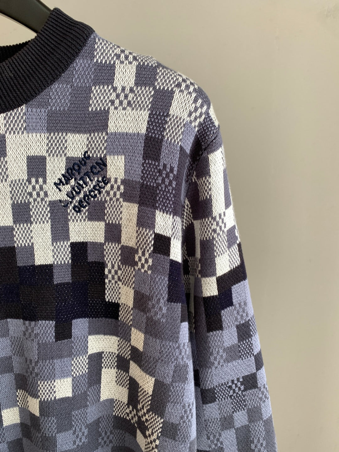 Louis Vuitton check knit sweater side view with long sleeve and navy hem