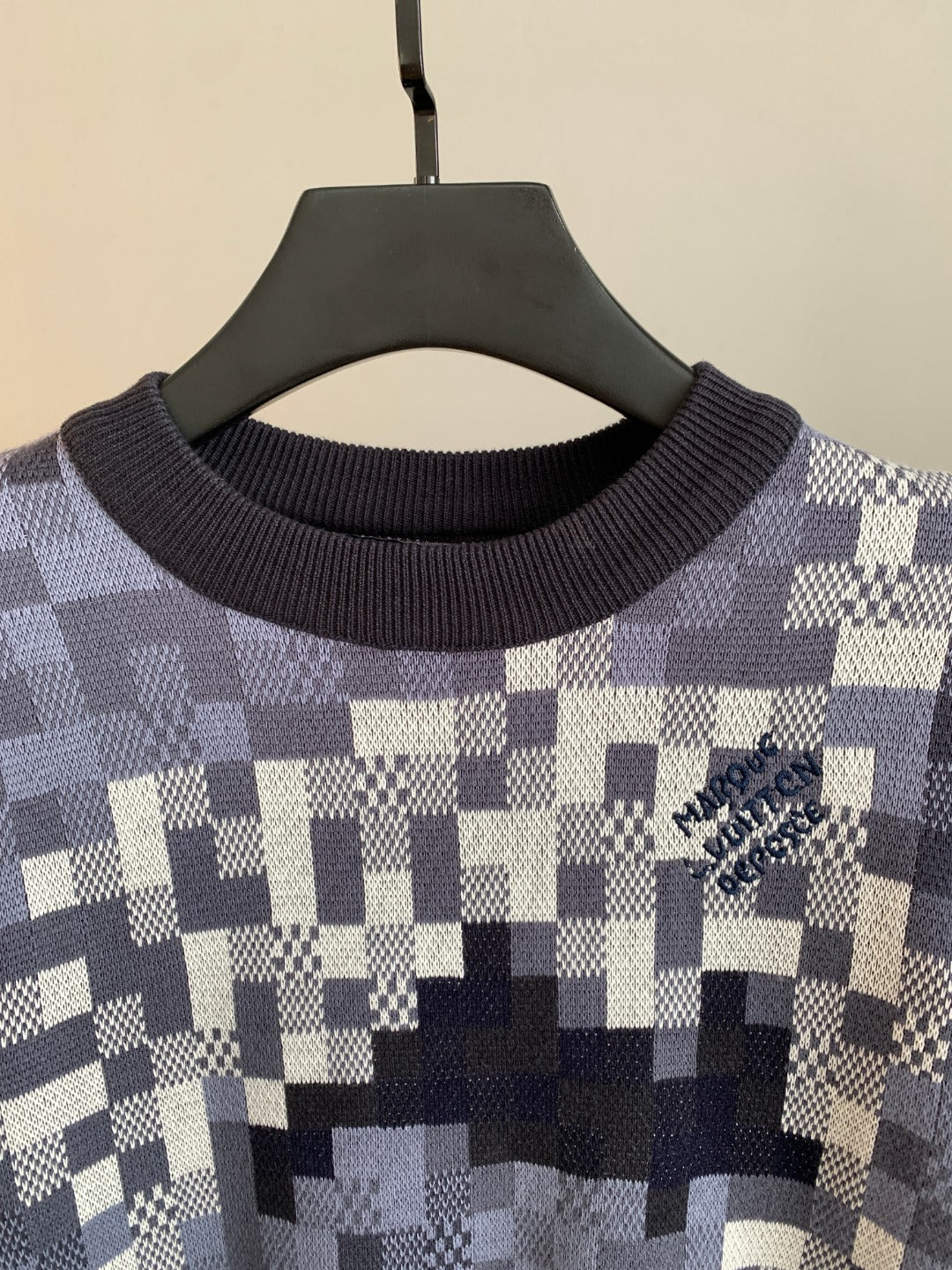 Louis Vuitton knit sweater chest close-up, crew neck, navy and white check pattern