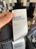 Louis Vuitton sweater care label reading 100% cotton inside fabric