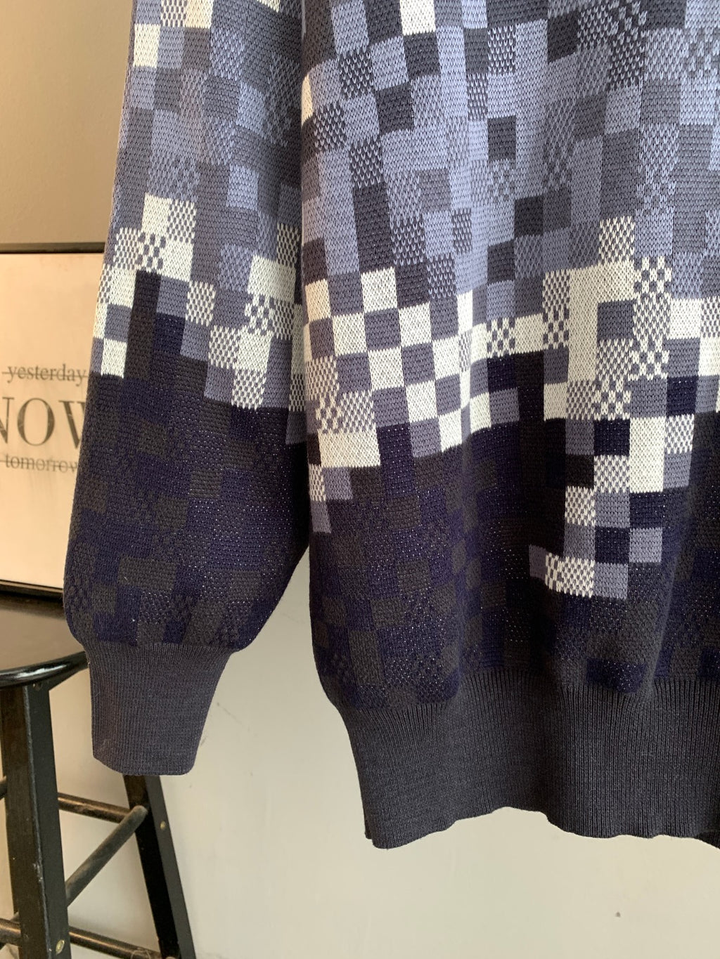Louis Vuitton check knit sweater lower half with navy hem and long sleeves