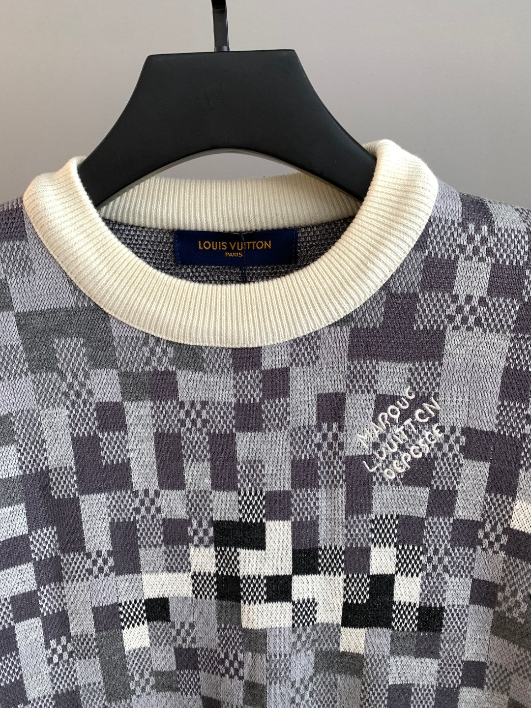 Louis Vuitton sweater front neckline with cream ribbed collar and check knit pattern