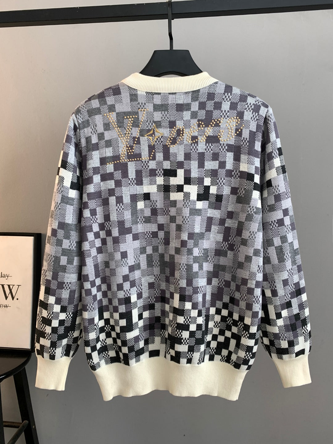Louis Vuitton long-sleeve sweater, black-and-white check knit with cream ribbed cuffs
